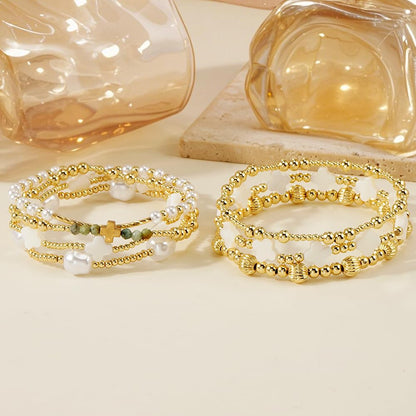 SHINUS BOHO 14K Gold Beaded Cross White Clover Pearl Stackable Bracelets for Women,7PCS Handmade Gold Beads Stretch Bracelets Stack Fashion Holiday Prom Jewelry Accessories Mothers Day Gifts Gift Friendship