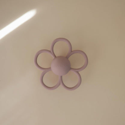 mushie Silicone Baby Daisy Rattle Teether Toy (Soft Lilac)