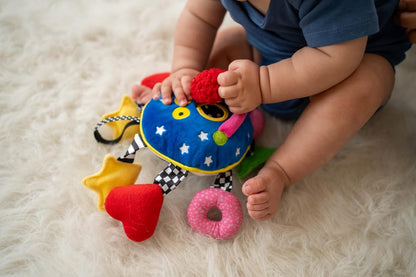 Manhattan Toy Baby Whoozit 6" Stroller and Travel Activity Toy