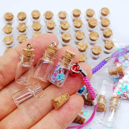 Minsily 100 Pcs 0.5ml Mini Small Glass Bottles with Cork Stoppers 20 Meters Twines Tiny Jars Clear Mini Glass Vials with Eye Screws Corked Bottle DIY Arts Crafts Projects Decoration Party Favors Gifts