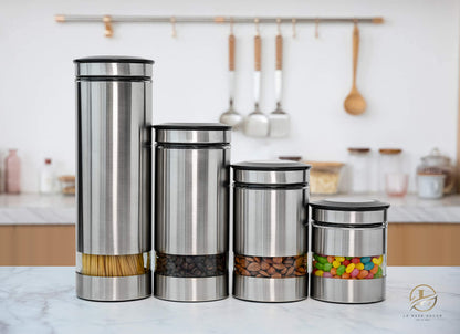Le'raze Airtight Glass Canister Set of 4 with Stainless Steel Sleeve for Kitchen Counter - Food Storage Containers with Glass Window and Airtight Lids - Pantry Storage and Organization Set