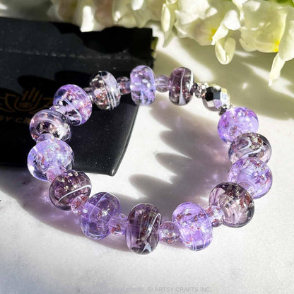 ARTSY Crafts Glow in The Dark Firefly Beads Bracelet, Handmade in USA, Colorful Donut Shaped Luminous Murano Glass Beads Jewelry Mermaid Crystals Inspirational Gift (Lavender + Violet)
