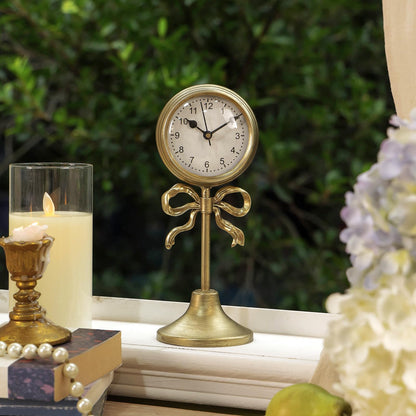 NIKKY HOME Gold Table Clock with Bow, Silent Non-Ticking Classic Elegant Battery Operated Decorative Mantel Desk Shelf Clock for Living Room Decor