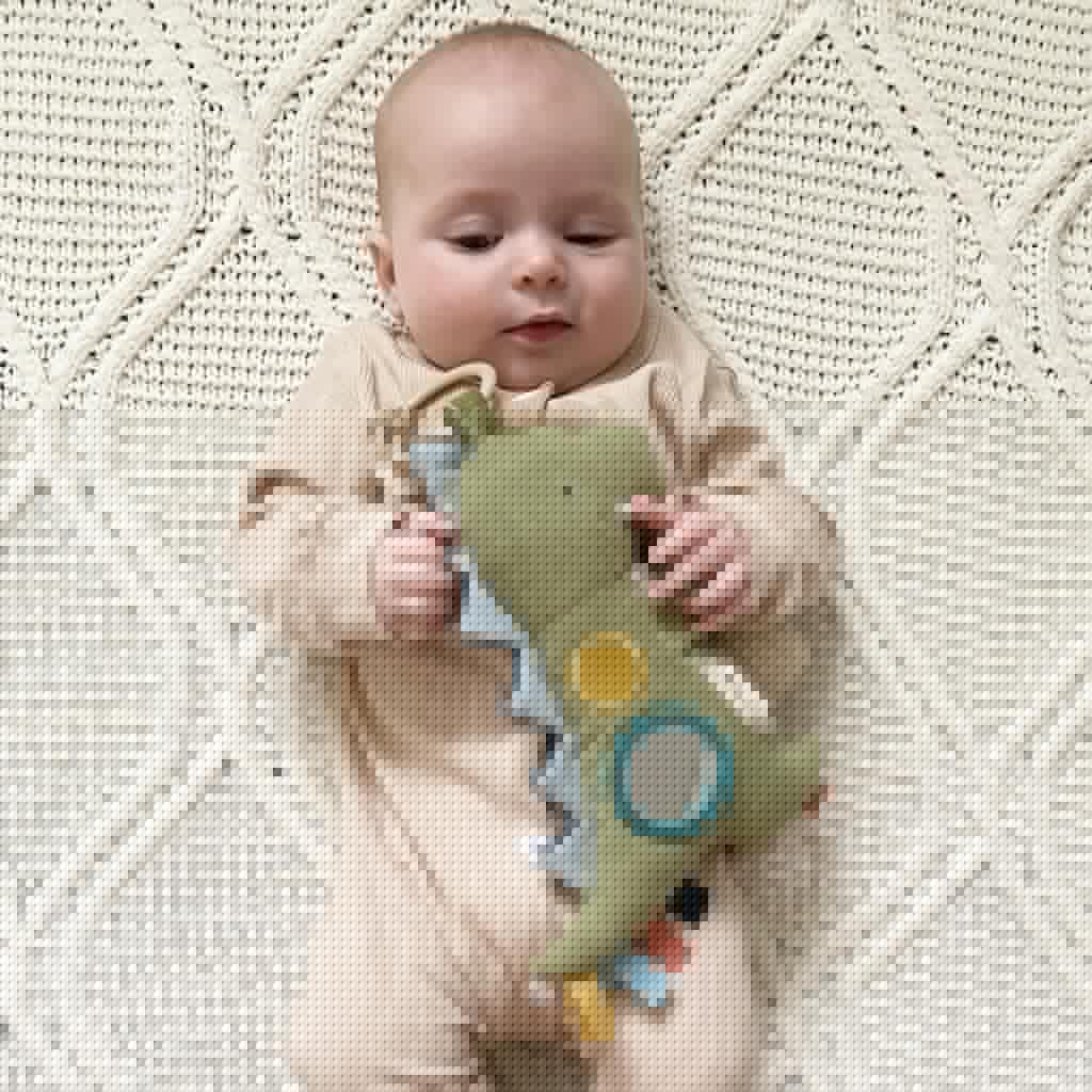 Itzy Ritzy Bitzy Traveler Car Seat & Stroller Toy for Babies – Developmental Sensory Toy Features Crinkle & Rattle Sounds & Multiple Textures –Hanging Travel Toy for On-the-Go Entertainment (Dinosaur)