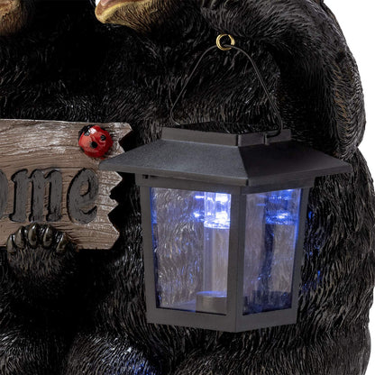 Alpine Corporation 15" H Outdoor Bear Couple with Lantern and Welcome Sign Statue with Solar LED Lights, Black