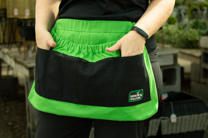 Seeding Square Harvest Garden Apron – pick fruits, vegetables, eggs and weeds & store small tools, seeds and personal items (Green Pockets on Black)