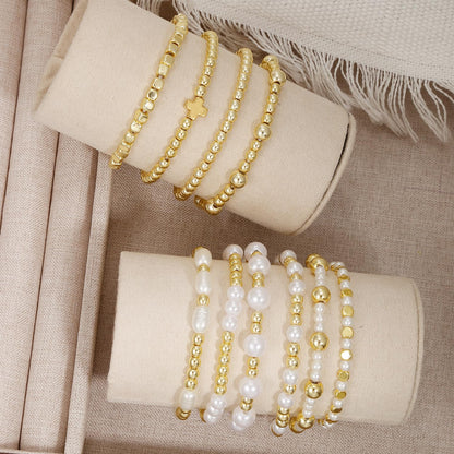 COLOYAN 10PCS Gold Bracelets for Women Stack, Cross Beaded Strand Bead Ball Stackable Gold Bracelet, Pearl Beaded Bracelets Elastic Bracelet Set